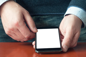 White business man holding a blank screen smartphone
