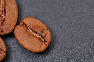 coffee beans on black background consistent with