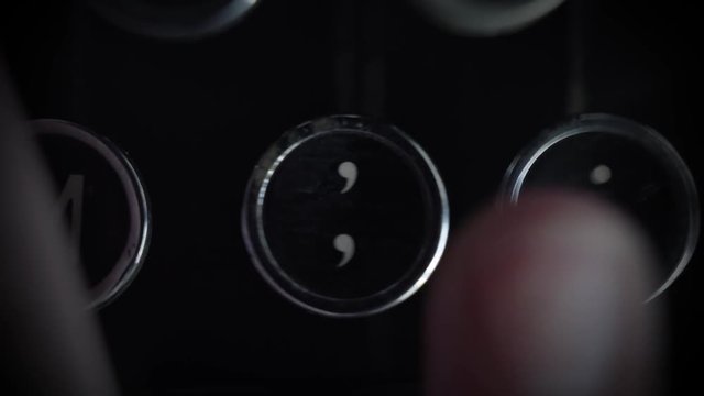 Macro close up of the quotation mark key on an old Typewriter.