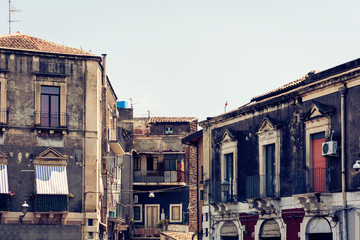 Beautiful cityscape of Italy, historical street of Catania, Sicily, facade of old houses.