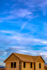House under construction against sky in Daybreak