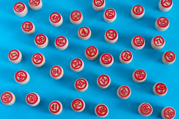 wooden kegs for bingo on a blue background