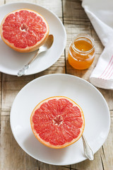 Fototapeta na wymiar Vegetarian breakfast for two baked grapefruit. Rustic style.