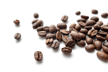Fototapeta premium Roasted coffee beans isolated on white background. Close-up.