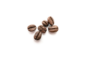 Coffee beans isolated on white background. Close-up.