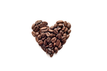 Heart shape of roasted coffee beans isolated on a white background.