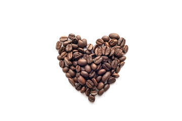 Heart shape of roasted coffee beans isolated on a white background.