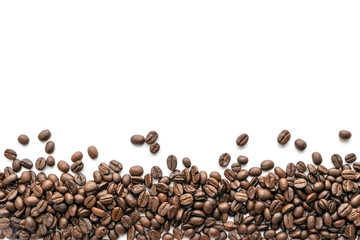 Roasted coffee beans on white background. Close-up.