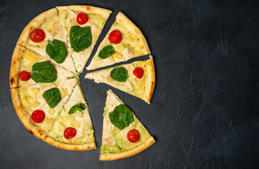 Delicious   pizza on a concrete background. Top view of hot pizza. 