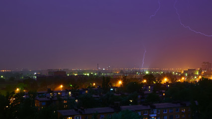 Lightning strike in the city Kyiv. Storm outside. Thunderstorm with lightning in the city. Moment...