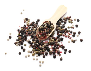 Colorful mixed pepper in wooden spoon isolated on white background