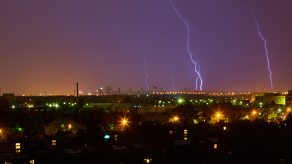 Lightning strike in the city Kyiv. Storm outside. Thunderstorm with lightning in the city. Moment...