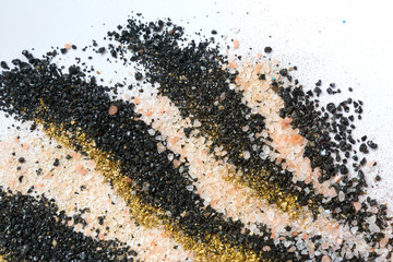 Layered colorful sand pattern. Marble style background. Black, white and gold powder texture
