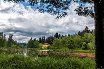 summer lake with puffy clouds