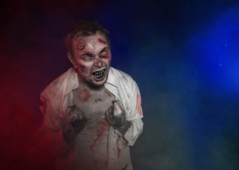 Horror terrible zombie man screaming. Halloween scene
