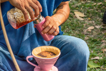 Sales people's traditional coffee to customers.