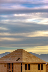 New home under construction with scenic background