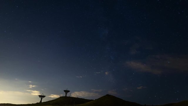 Night Sky time lapse with parabolic dish antennas, Table Mountain. Colorado
