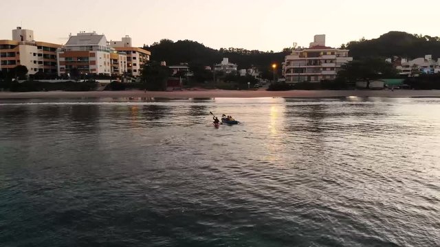 Firend Kayaking to the Coast in Brazil. Tourist Kayaking in Atlantic Sea. Florianopolis, 2018