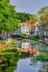 Fototapeta na wymiar Delft city view with canals in Holland