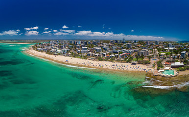 Obraz premium Aerial drone panoramic image of ocean waves on a Kings beach, Caloundra, Queensland, Australia