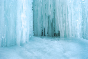 background - a section of glacier with icicles