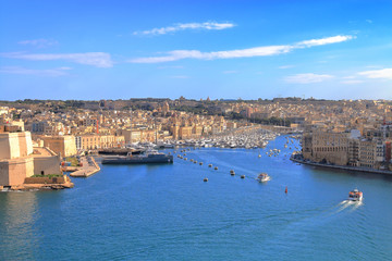 Fototapeta na wymiar View of the harbor of the island of Malta from the height of the city of Valletta.