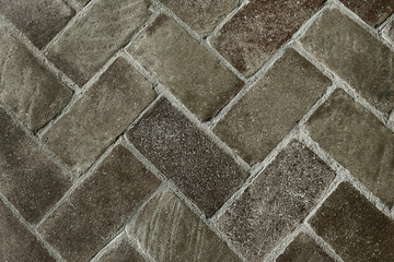 Old grey stone pavement background texture