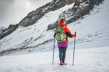 Young woman hiking in the mountains