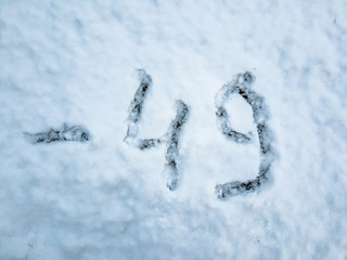 Temperature of -49 written in the freshly fallen snow