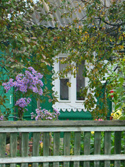 Beautiful window of countryside house on rainy autumn day - 246599800