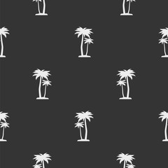 Fototapeta na wymiar Small palm trees. Seamless vector pattern.