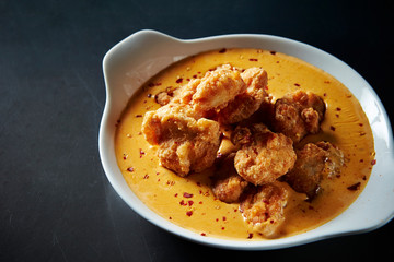 Fried chicken with cheese sauce