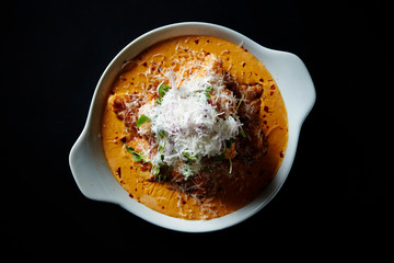 Fried chicken with onion and cheese sauce 