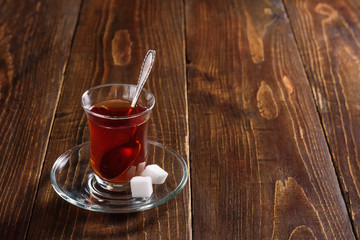 Turkish tea on wooden background