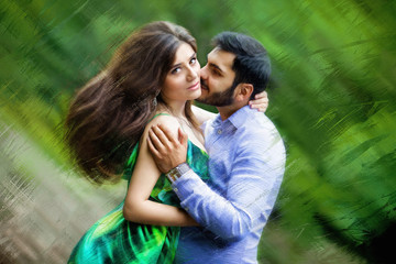 Fototapeta premium Beautiful young couple man and woman are in nature.