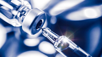 Vaccine needle​ syringe​ hypodermic​ injection single dose for prevention​ immune treatment​ illness​ virus​ disease​ in baby​ child​ and adult.concept antibiotic​ drug insullin.selective focus