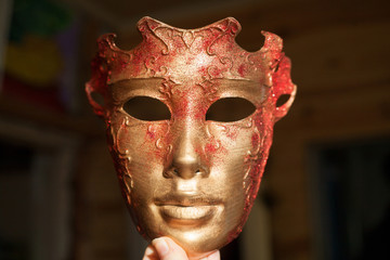 Beautiful carnival mask gold and red colors