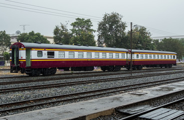 Fototapeta premium Thirst class passenger car is parking in the yard.