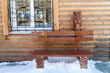 beautiful decorative bench carved in the snow