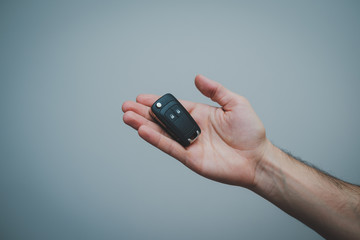 hand holding remote control