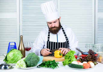 Basic cooking processes. Man master chef or amateur cooking food. Sharp knife chopping vegetable....