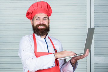 Grocery shop online. Delivery service. Chef laptop at kitchen. Culinary school. Hipster in hat and...
