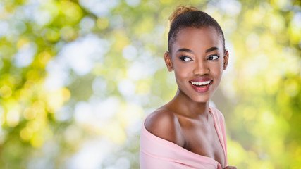 Beautiful african american girl in green