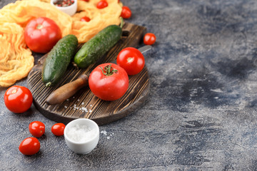 Fototapeta na wymiar Cucumber and cherry tomatoes