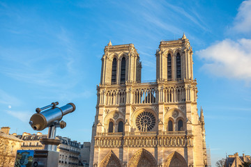 binoculars on Notre Dame de Paris, medieval church in Paris, France