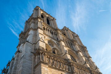 facade of notre dame de Paris, medieval cathedral (church) in paris, france