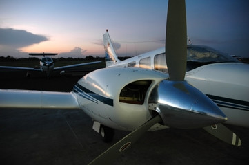 Fototapeta na wymiar airplane parked at dusk