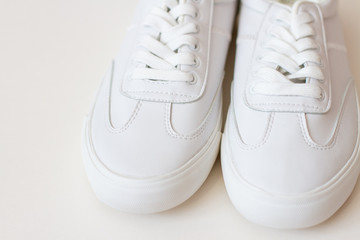 pair of white shoes isolated on white background