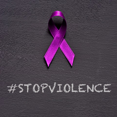purple ribbon and text stop violence